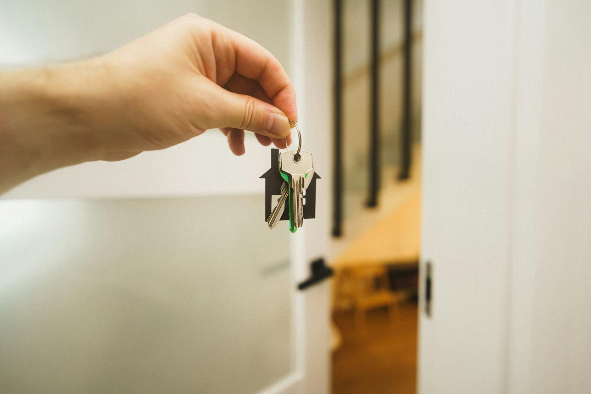 A real estate agent reviewing comparables and pricing strategy with a seller.
