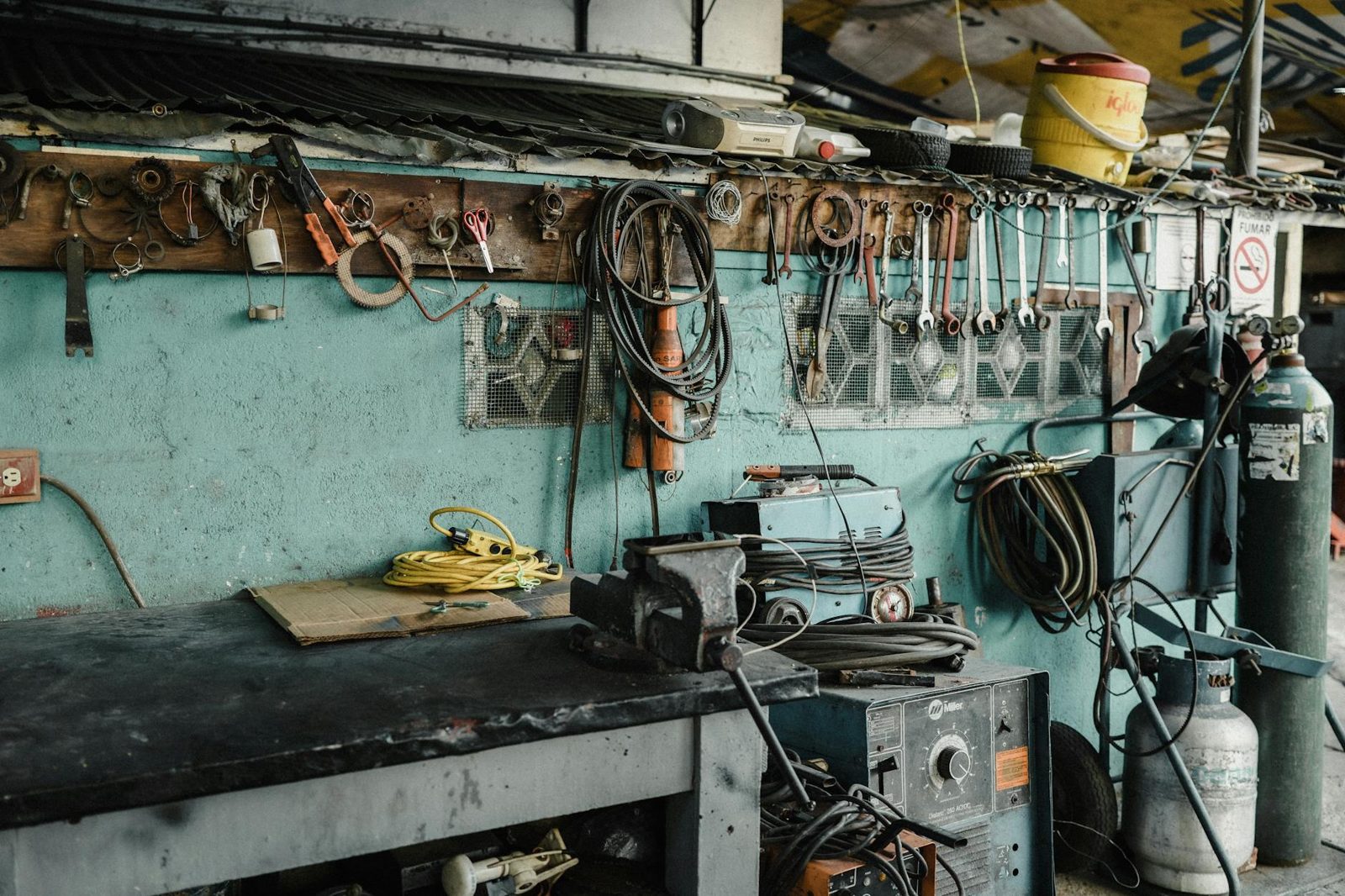 Pre-listing repair tools laid out on a workbench.