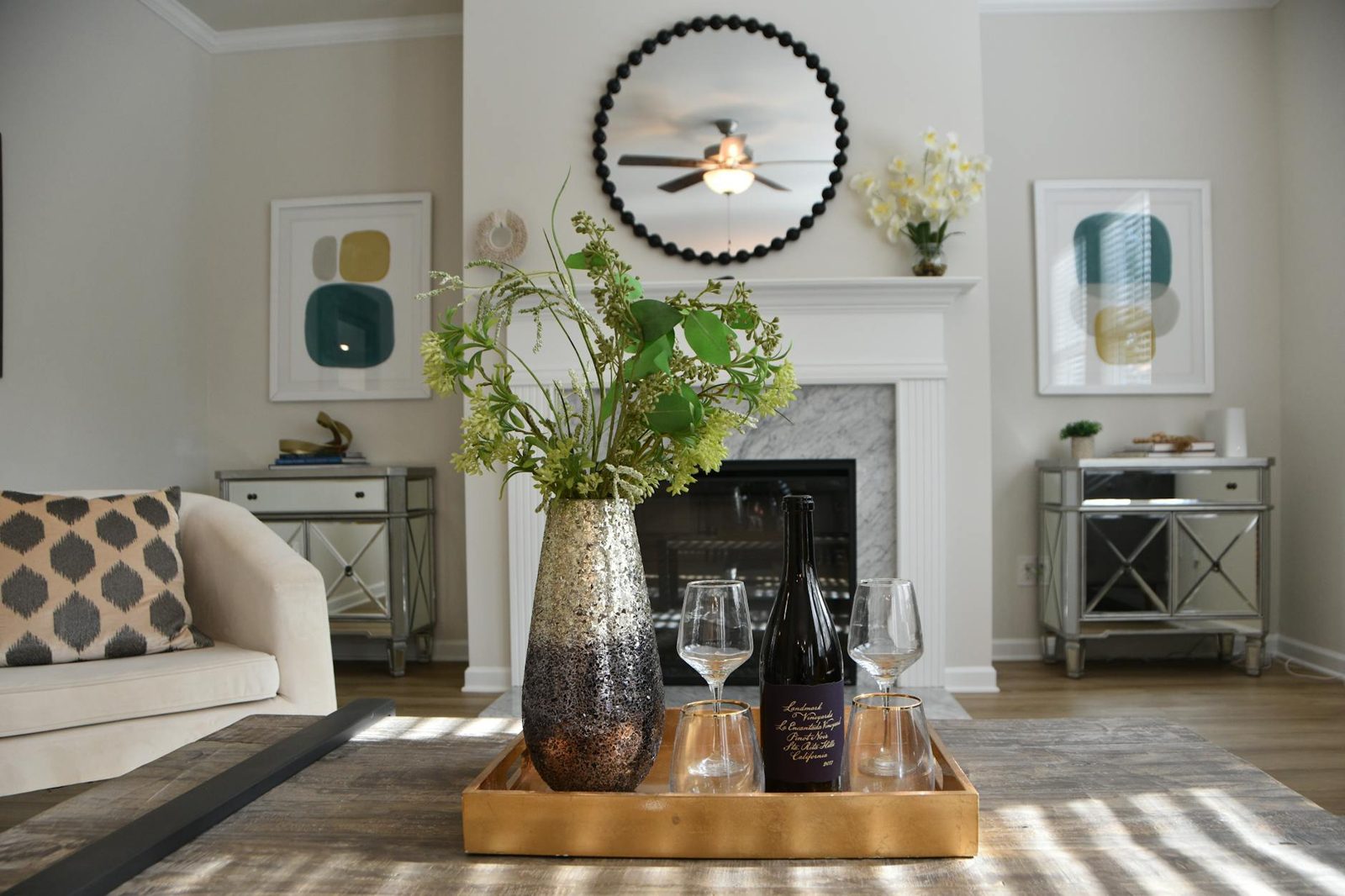 Professionally staged living room with neutral palette and uncluttered surfaces.