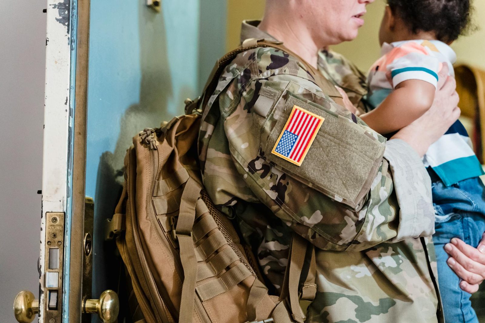 Loan officer explaining VA loan myths to a veteran homebuyer