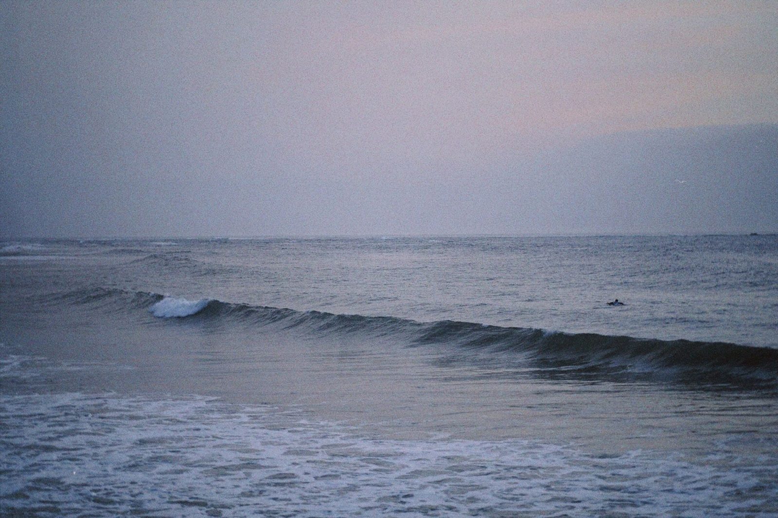 A wide, calm Atlantic beach in the morning — the everyday backdrop of an island beach town.