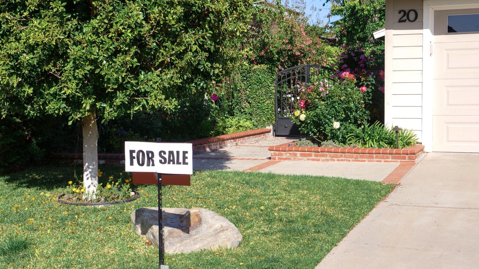 Well-maintained home exterior with fresh landscaping and curb appeal