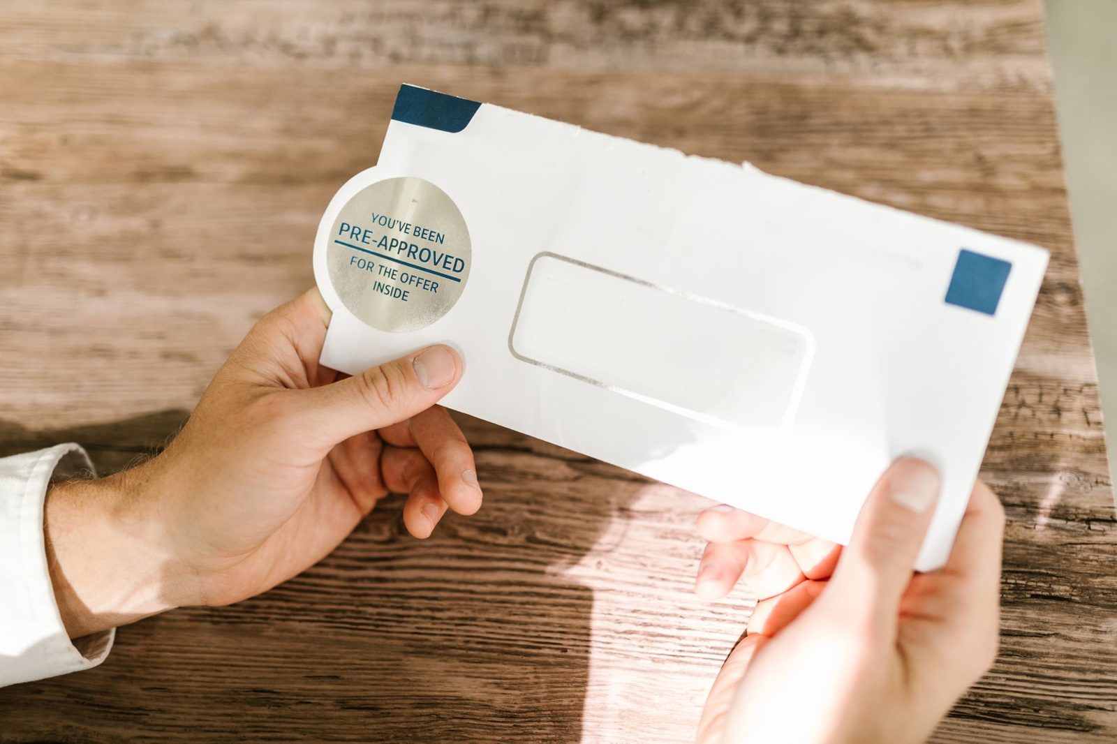 A mortgage pre-approval letter on a desk — a ceiling, not a recommendation.