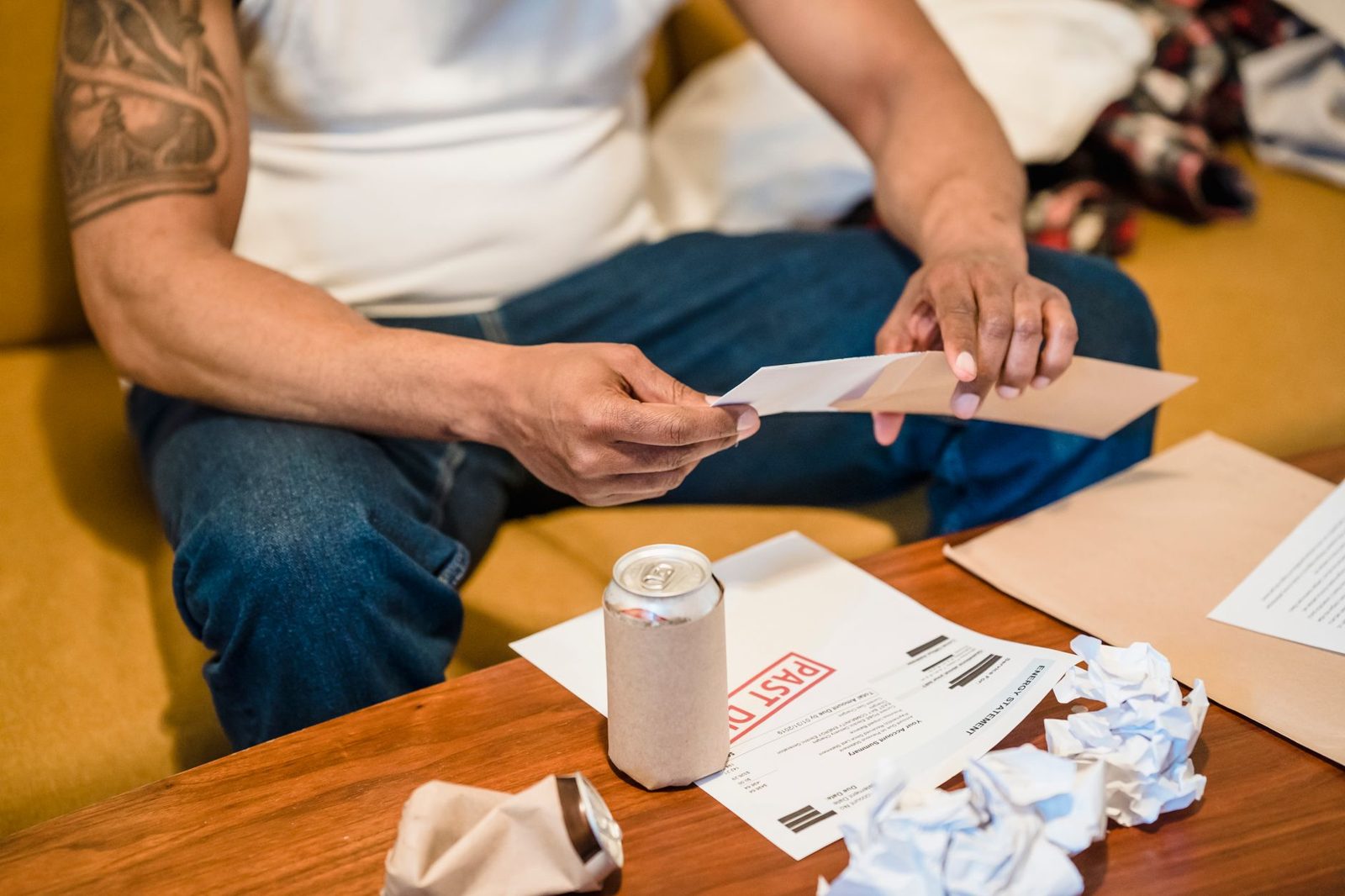 Home buyer reading a pre-approval letter at a table