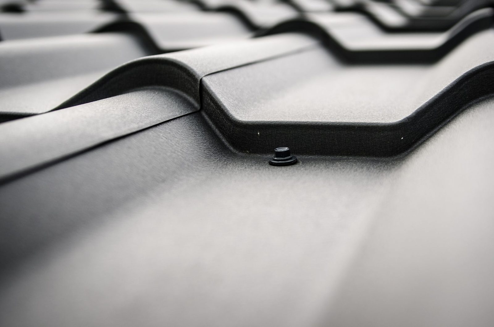 Standing seam metal roof on a residential home representing long-term durability