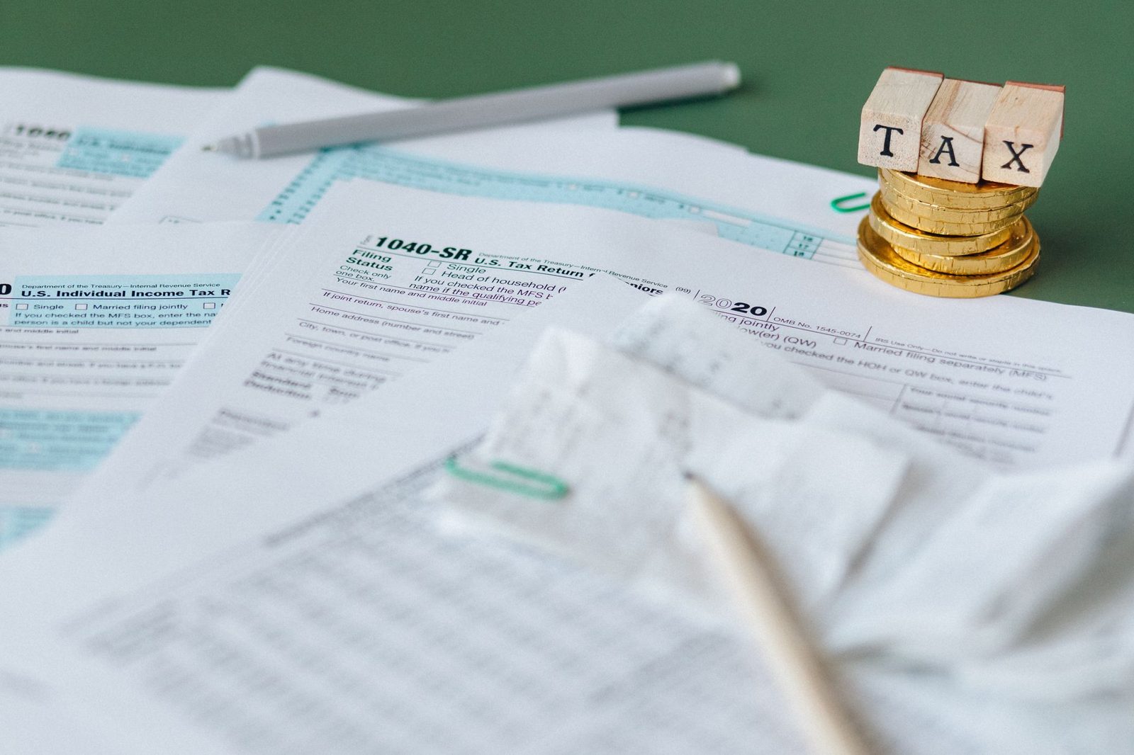 Mortgage paperwork including pay stubs and tax return documents