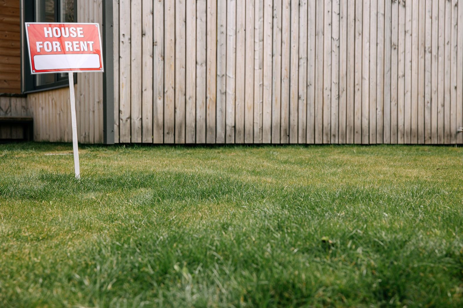 A price reduction sign on a home listing, signaling a market adjustment.