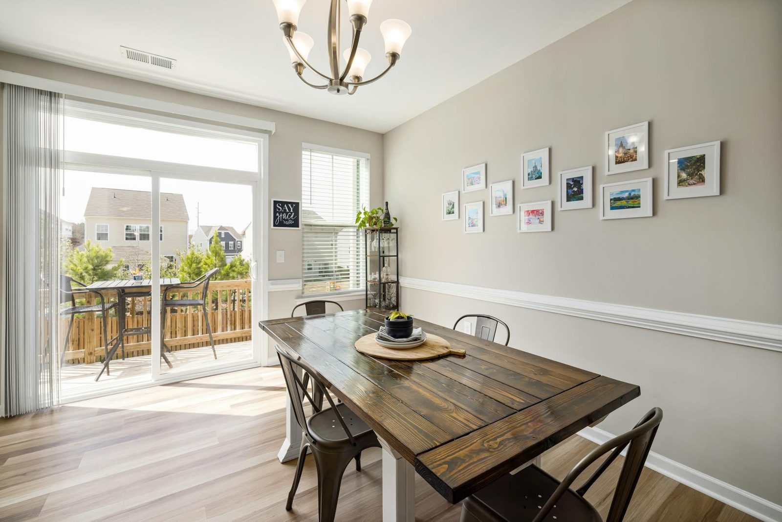 A photographer capturing a bright home interior — professional photos are the first showing for most buyers.