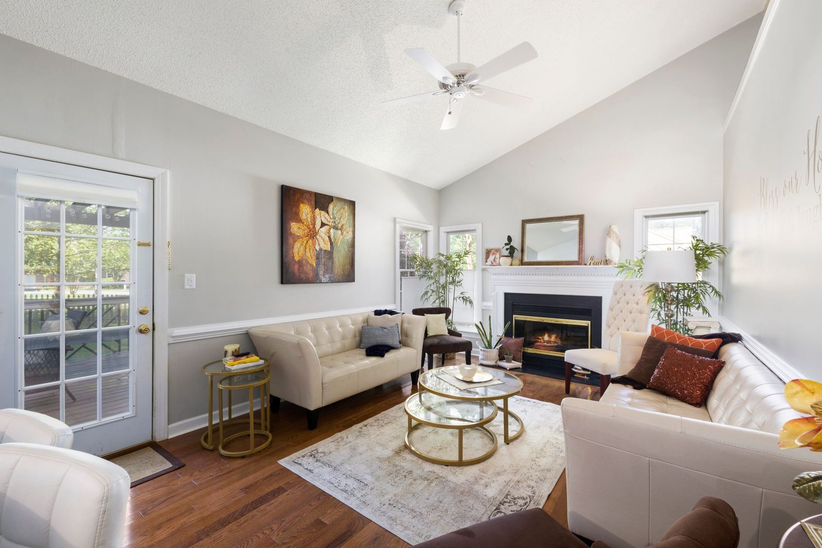Professionally staged living room with neutral furniture and decluttered space