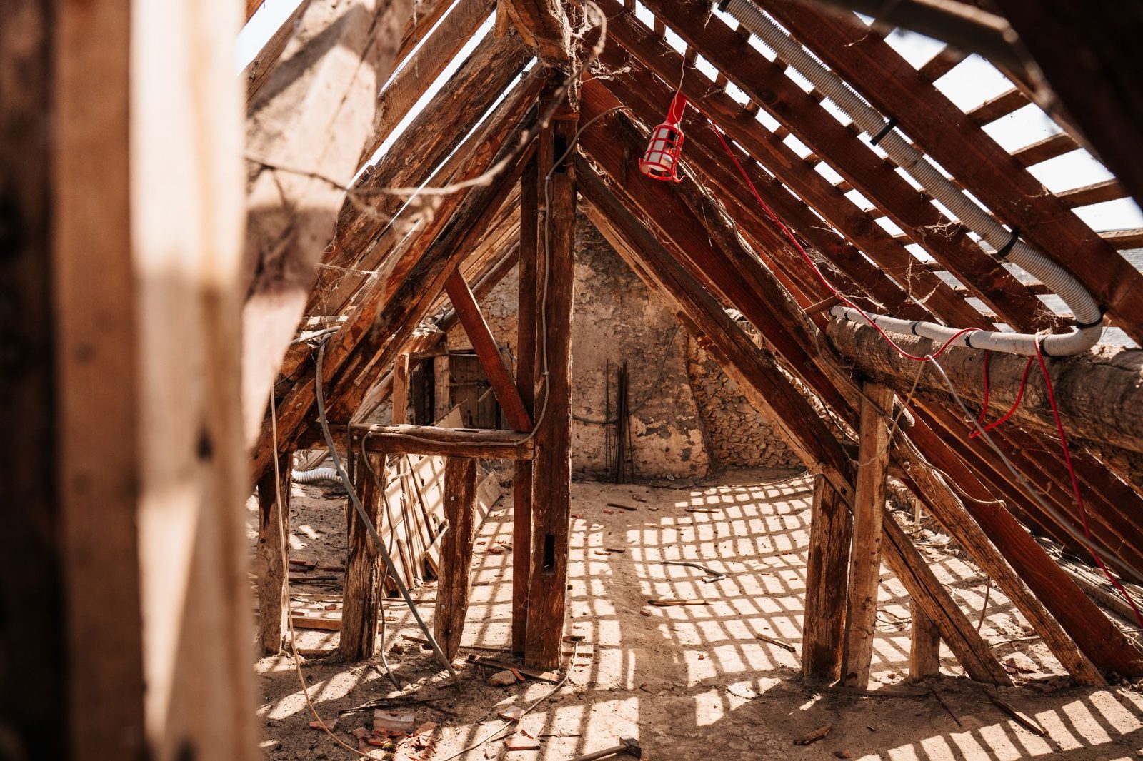 Attic interior showing roof deck and rafters during a home inspection