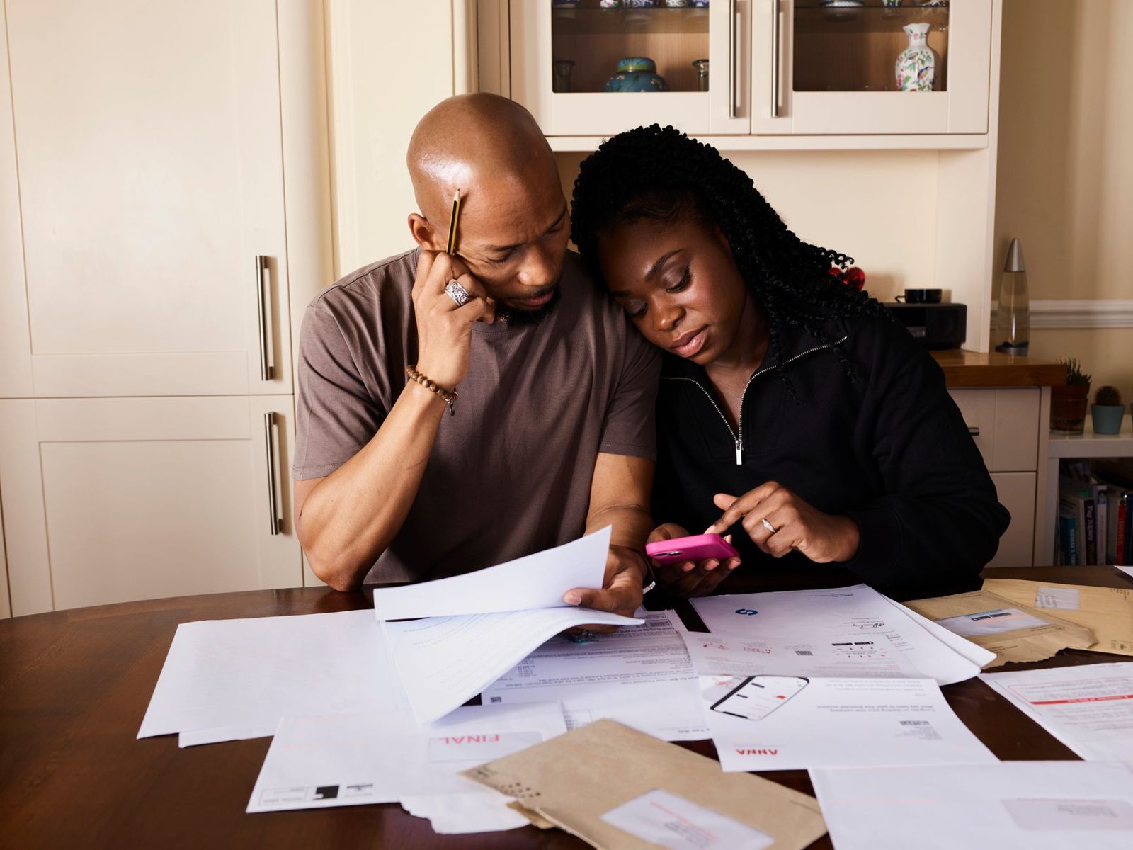 Couple reviewing their home budget and savings plan together